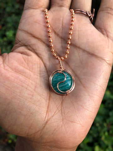 Blue-green round crystal with beaded copper necklace